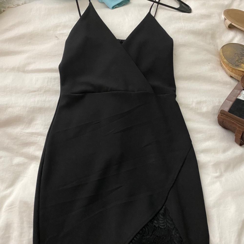 Black spaghetti strap body con with lace trim